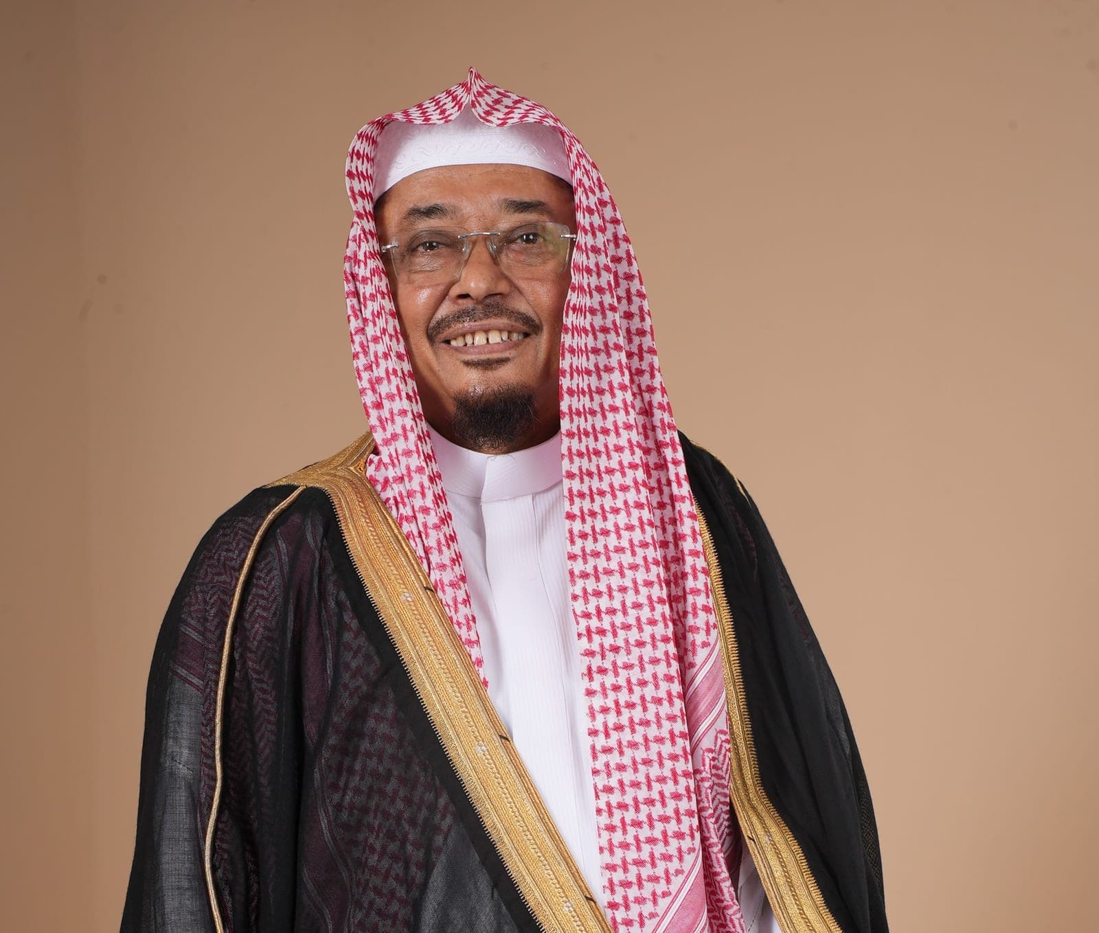 Formal portrait of Dr. Noor Mohammed Badie.