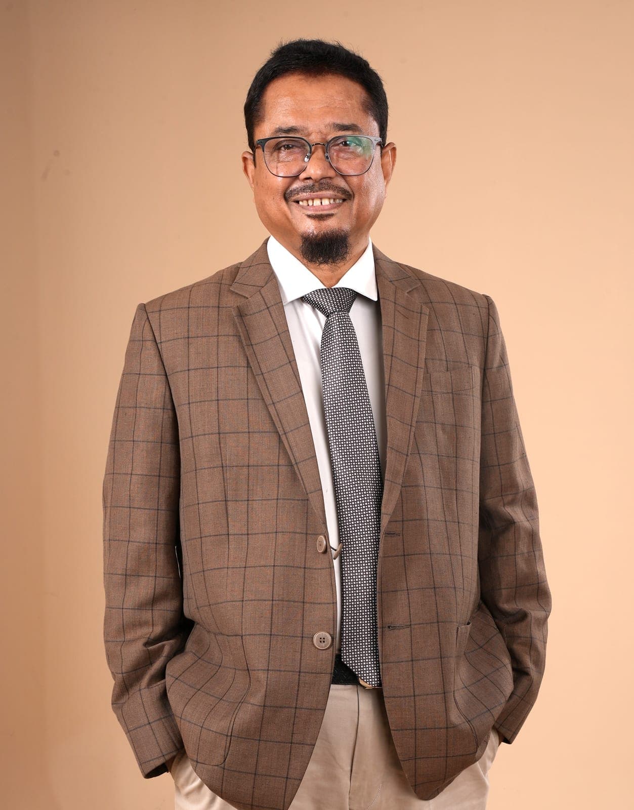 An earlier photograph from Dr. Noor Mohammed Badie's professional archive.